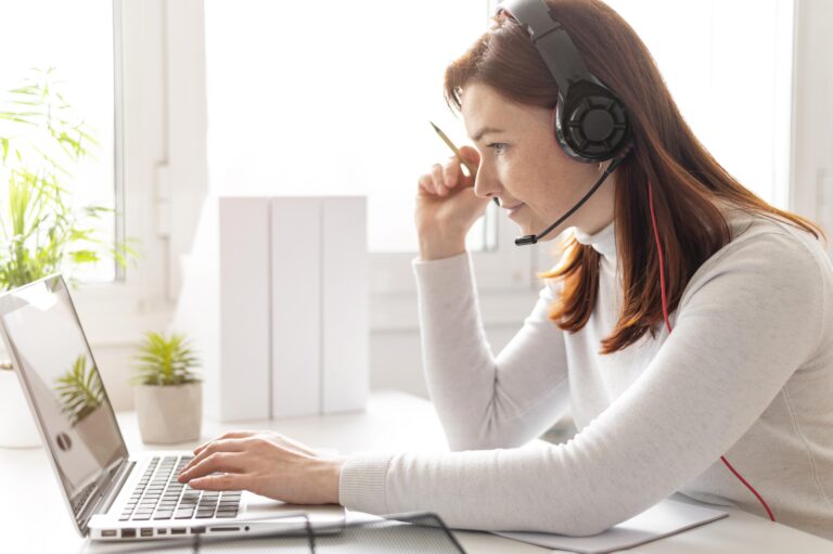 Call center Services offered by Woman using laptop